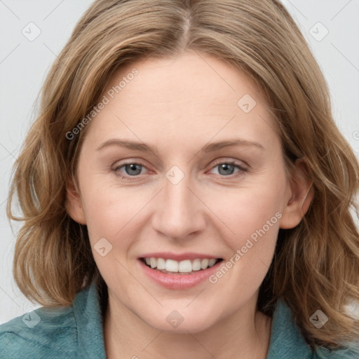 Joyful white young-adult female with medium  brown hair and blue eyes