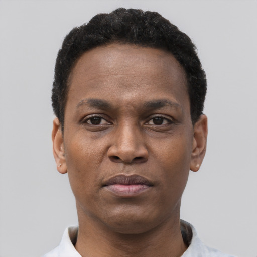 Neutral black young-adult male with short  black hair and brown eyes