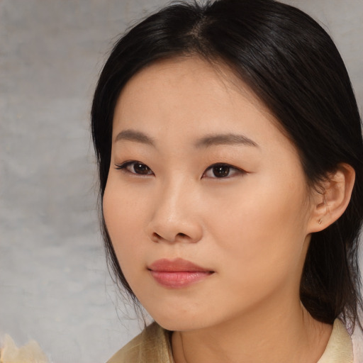 Neutral asian young-adult female with medium  black hair and brown eyes