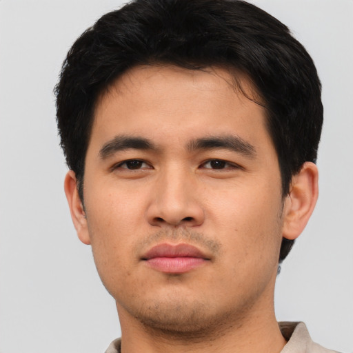 Neutral asian young-adult male with short  brown hair and brown eyes