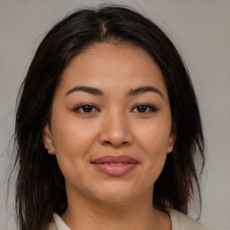 Joyful asian young-adult female with medium  brown hair and brown eyes