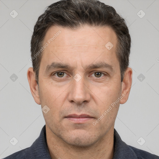 Neutral white adult male with short  brown hair and brown eyes