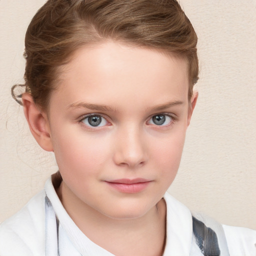 Neutral white child female with short  brown hair and blue eyes