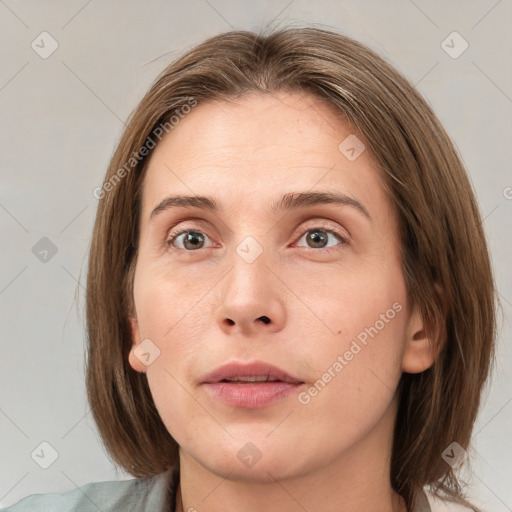 Neutral white young-adult female with medium  brown hair and grey eyes