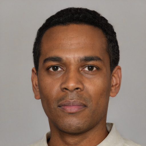 Neutral black young-adult male with short  black hair and brown eyes