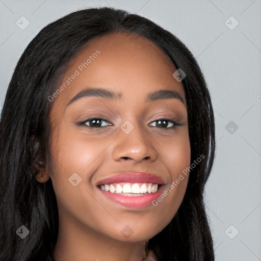 Joyful latino young-adult female with long  black hair and brown eyes