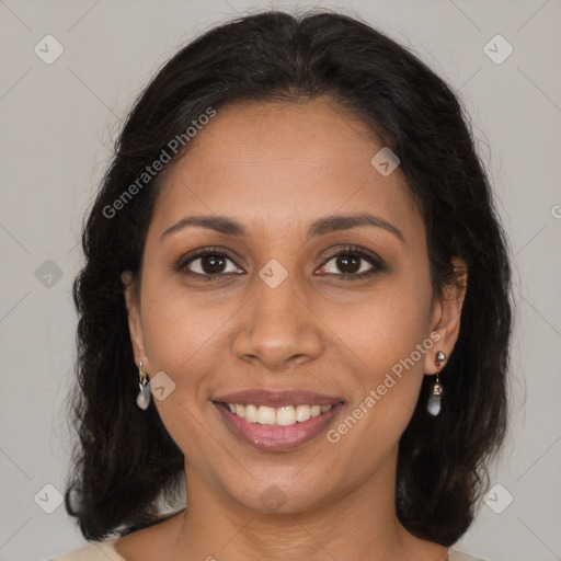 Joyful latino young-adult female with medium  brown hair and brown eyes