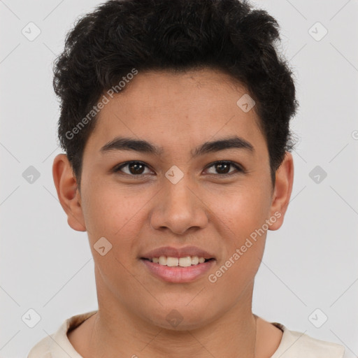 Joyful latino young-adult male with short  brown hair and brown eyes