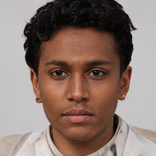 Neutral latino young-adult male with short  brown hair and brown eyes