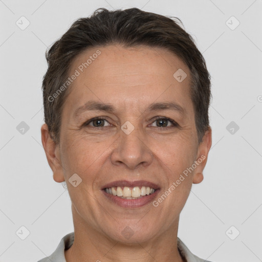 Joyful white adult female with short  brown hair and brown eyes