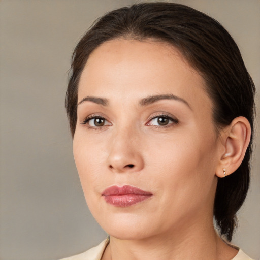 Joyful white young-adult female with medium  brown hair and brown eyes