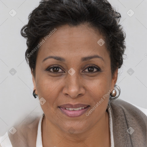 Joyful black adult female with short  brown hair and brown eyes