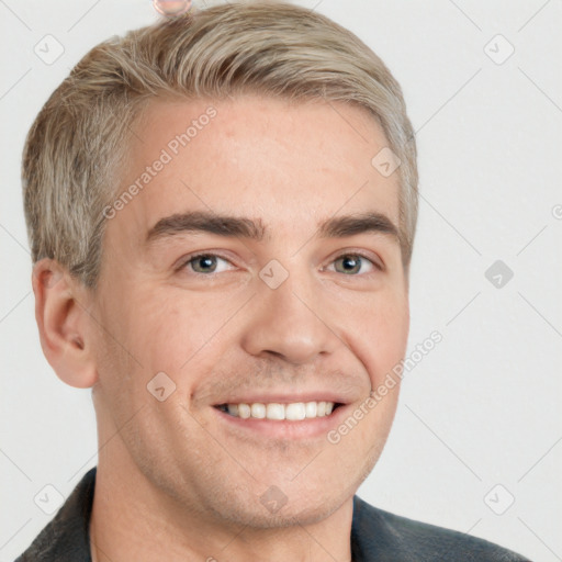 Joyful white adult male with short  brown hair and grey eyes