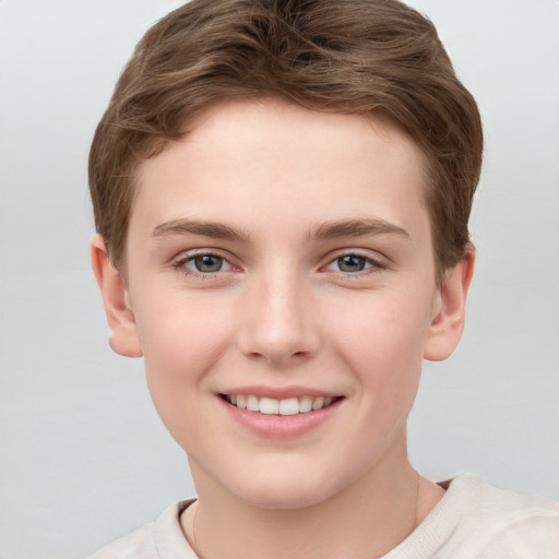 Joyful white child female with short  brown hair and grey eyes