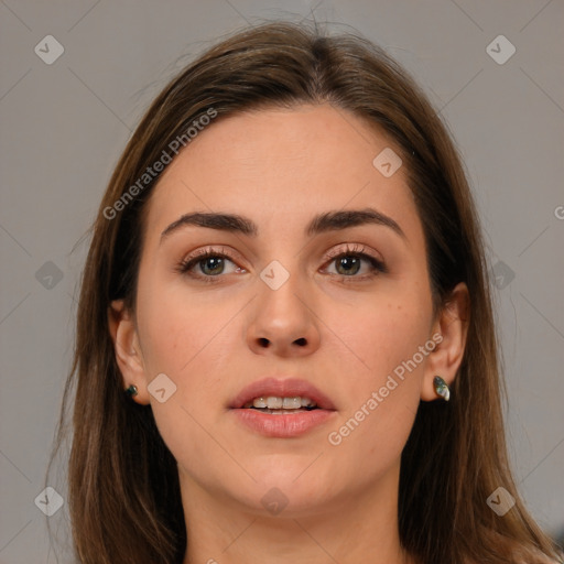 Neutral white young-adult female with long  brown hair and brown eyes