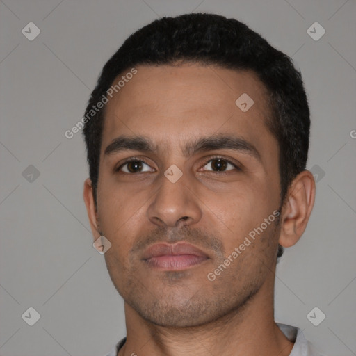 Neutral latino young-adult male with short  black hair and brown eyes