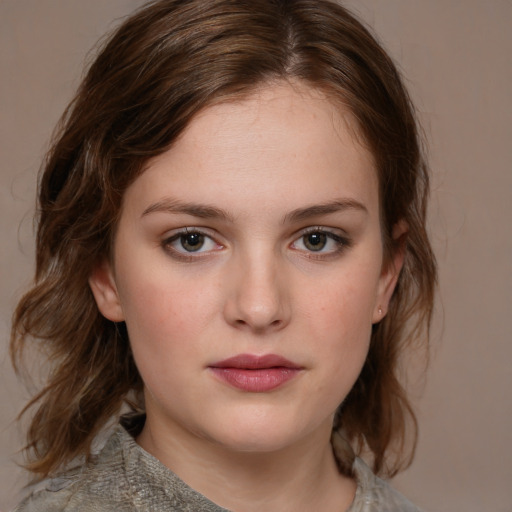 Neutral white young-adult female with medium  brown hair and blue eyes