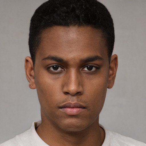 Neutral black young-adult male with short  brown hair and brown eyes