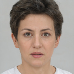 Neutral white young-adult female with short  brown hair and brown eyes