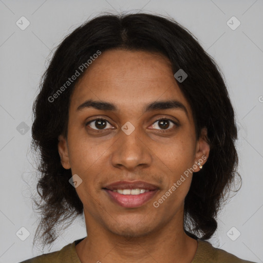 Joyful black adult female with medium  brown hair and brown eyes