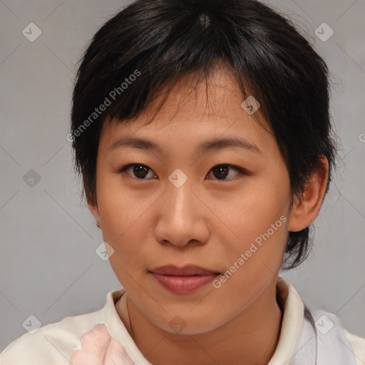 Joyful asian young-adult female with medium  brown hair and brown eyes