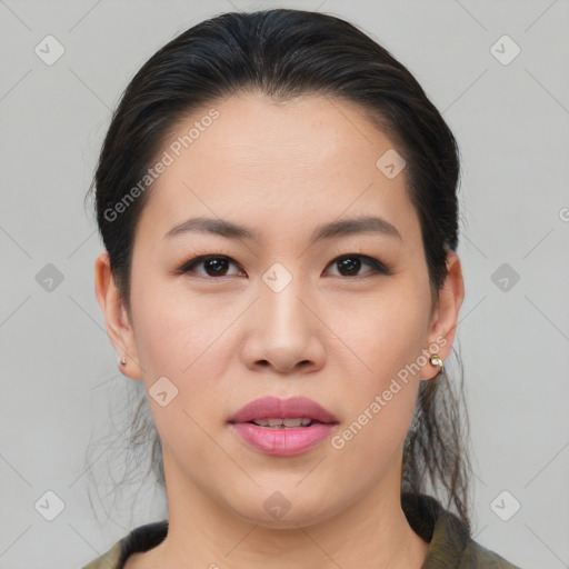 Joyful asian young-adult female with medium  brown hair and brown eyes