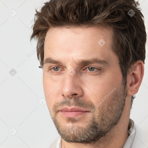 Neutral white adult male with short  brown hair and brown eyes