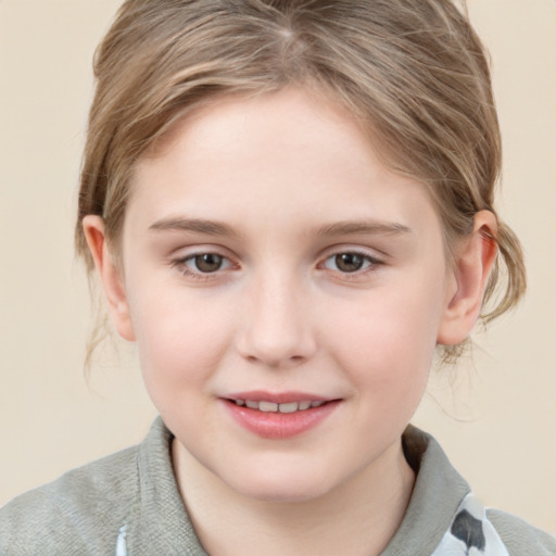 Joyful white child female with medium  brown hair and grey eyes