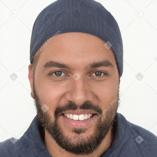 Joyful white young-adult male with short  black hair and brown eyes