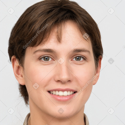 Joyful white young-adult female with short  brown hair and grey eyes