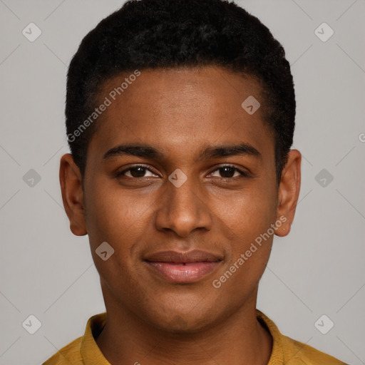 Joyful black young-adult male with short  brown hair and brown eyes