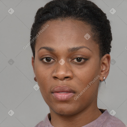 Neutral black young-adult female with short  black hair and brown eyes