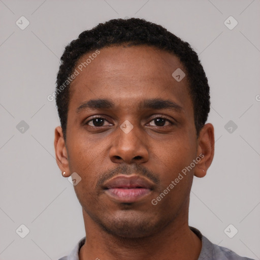 Neutral black young-adult male with short  black hair and brown eyes