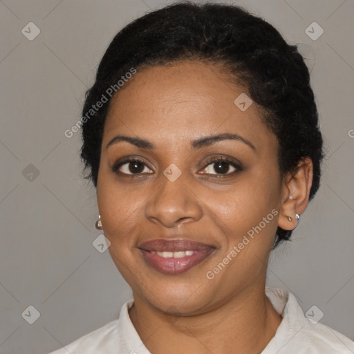 Joyful black adult female with short  black hair and brown eyes