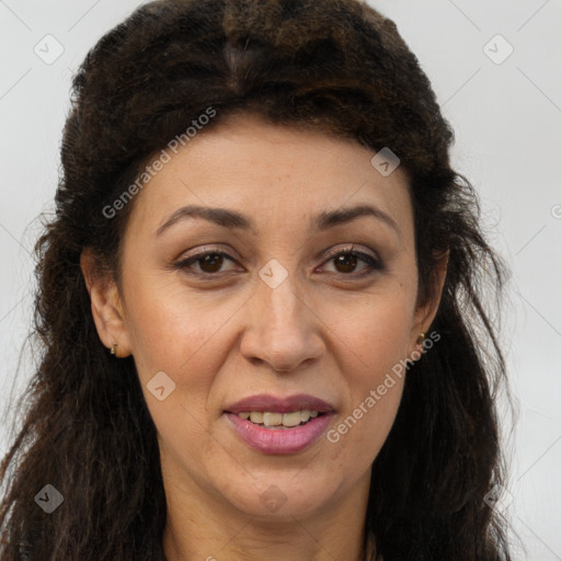 Joyful white adult female with long  brown hair and brown eyes