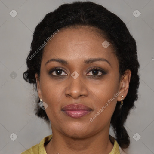 Joyful black young-adult female with medium  brown hair and brown eyes