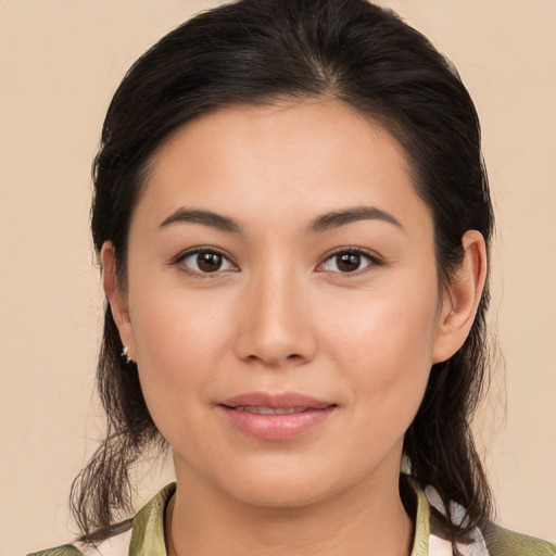 Joyful white young-adult female with medium  brown hair and brown eyes