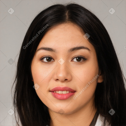 Joyful asian young-adult female with long  black hair and brown eyes