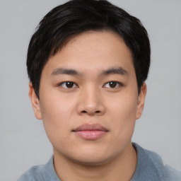 Neutral asian young-adult male with short  black hair and brown eyes