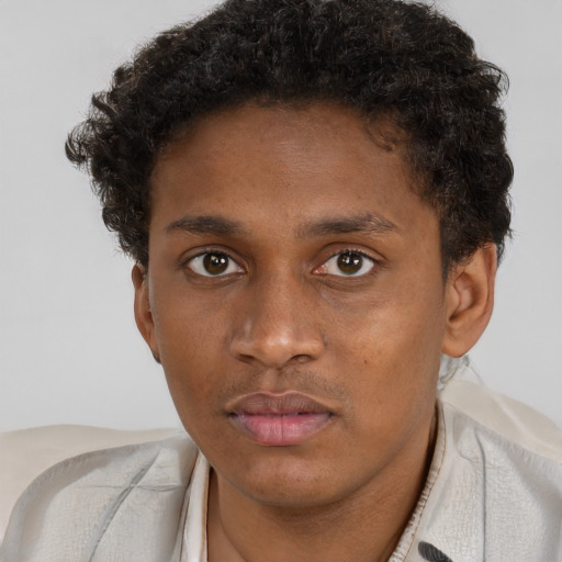 Neutral black young-adult male with short  brown hair and brown eyes