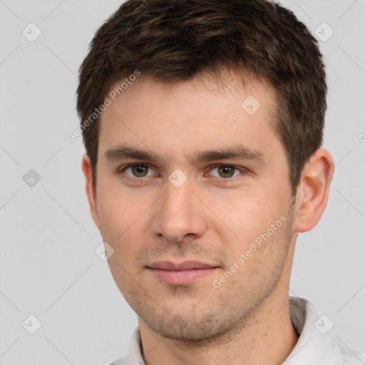 Neutral white young-adult male with short  brown hair and brown eyes