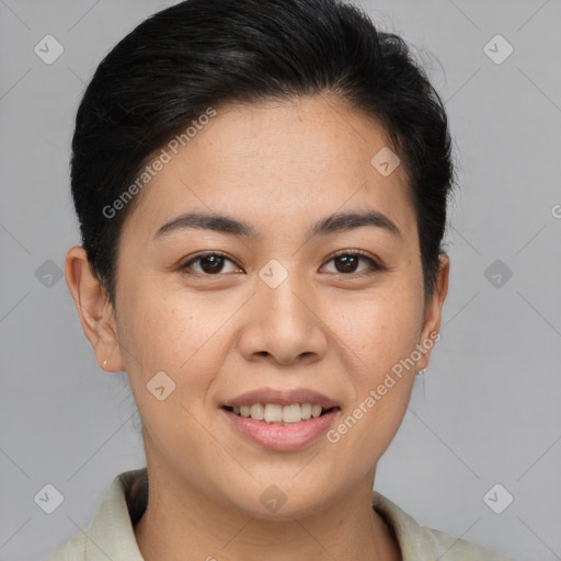 Joyful asian young-adult female with short  brown hair and brown eyes