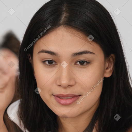 Joyful asian young-adult female with long  brown hair and brown eyes