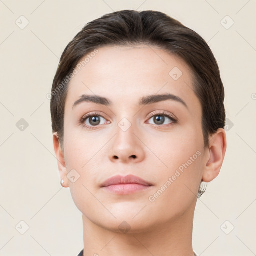 Neutral white young-adult female with short  brown hair and brown eyes