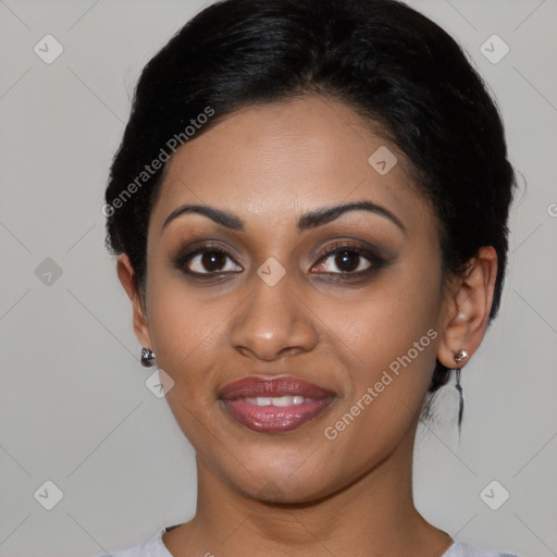 Joyful latino young-adult female with short  black hair and brown eyes