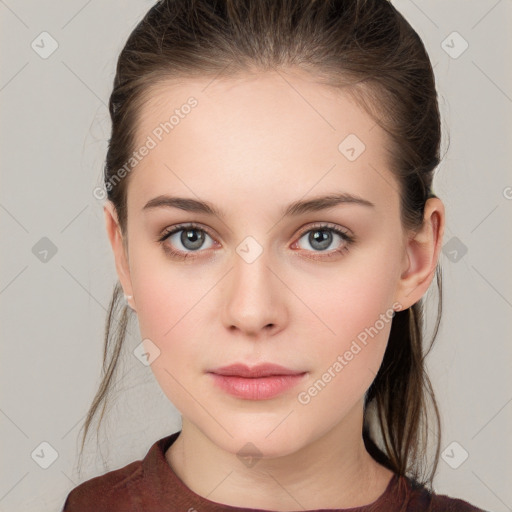 Neutral white young-adult female with medium  brown hair and grey eyes