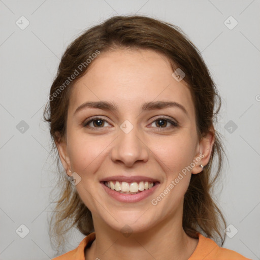 Joyful white young-adult female with medium  brown hair and grey eyes