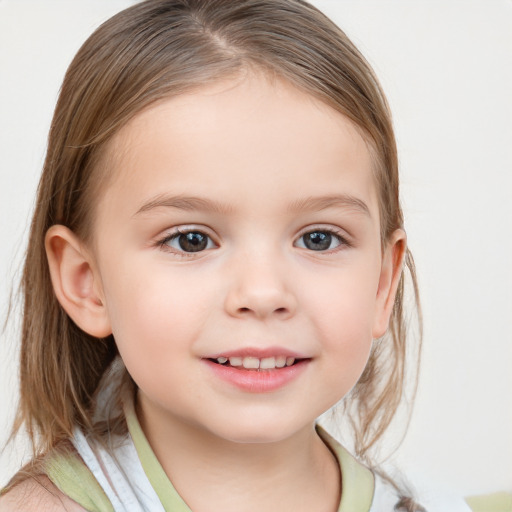 Joyful white child female with medium  brown hair and brown eyes