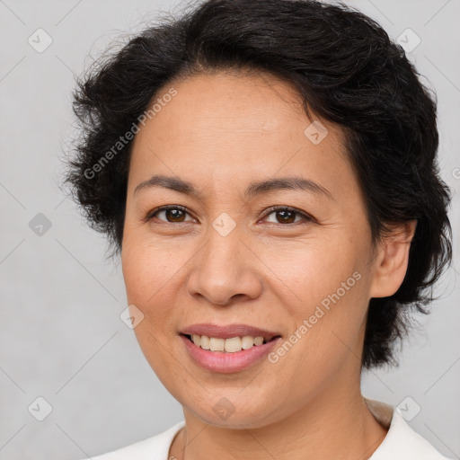 Joyful white adult female with short  brown hair and brown eyes