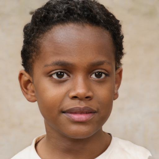 Joyful black child female with short  brown hair and brown eyes